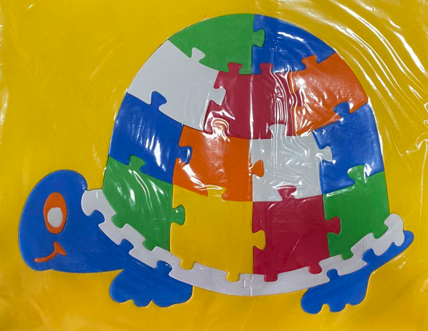 <p>64. TURTLE SHPAED RUBBER JIGSAW PUZZLE</p>