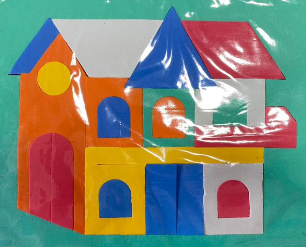 <p>71. HOUSE SHAPED RUBBER JIGSAW PUZZLE</p>