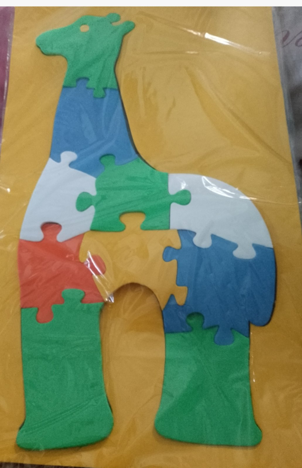 <p>74. CAMEL SHPAED RUBBER JIGSAW PUZZLE</p>